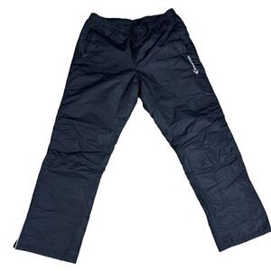 Easton Men’s Black snow pants Size XL Two pockets with zippers. Two zippers on t